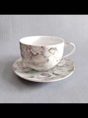 CALDO FREDDO FINE PORCELAIN CUP AND SAUCER